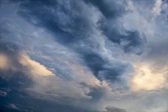 Cloud formation cumulus cloud (Cumulus) in front of sunset