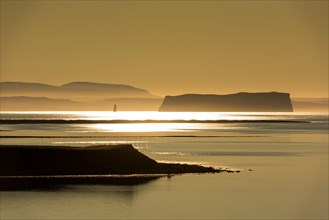 Saga and bird island Drangey in the evening light