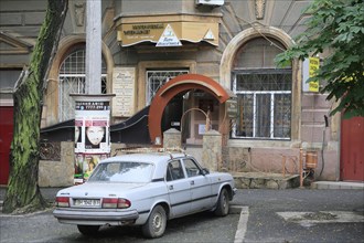 Old car of the Russian brand Volga in a street in Primorsky district