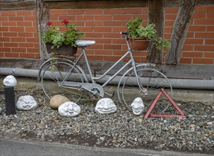 Silver bicycle as decopration in front of a house in the Rundlingsdorf Meuchelfitz