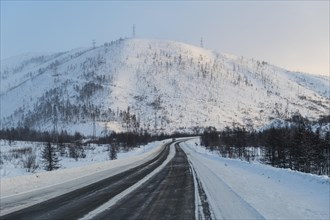 Snow covered mountains along the Road of Bones
