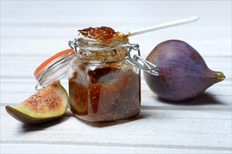 Fig jam in glass and figs