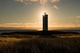 Lighthouse in the backlight