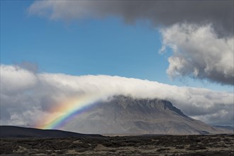 Rainbow and clouds at the table volcano Heroubreio or Herdubreid