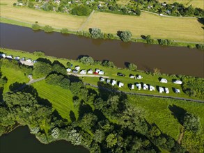 Drone shot of the river Weser with RV park near Holzminden
