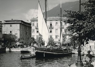 Lake Garda in 1960: Malcesine harbour with two-masted sailing ship
