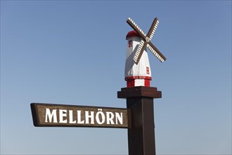 Original street sign with carved windmill