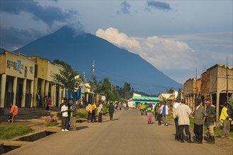 Little village before the towering volcanos of the Virunga National Park