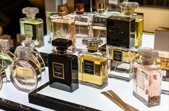 Various perfume bottles on a display