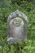 Gravestone with flower at the historic Jewish cemetery