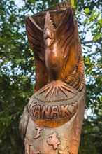 Hand carved wooden statues im the center of Noumea