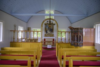 Church interior view looking towards the altar and pulpit