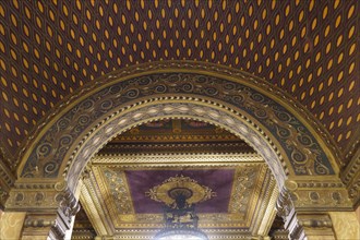 Entrance area with wall painting of the Palazzi degli Ambasciatori Embassy palaces with archway to the Quartiere Coppede