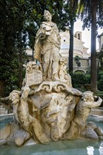 Fountain in the courtyard of Palazzo Venezia with allegorical fountain figure