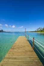 Pier in the turquoise waters of Muri beach
