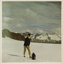 Mountain holiday in 1961: Young woman with ice axe and backpack on the Guslarferner