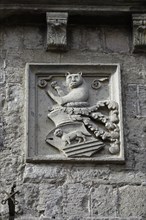Coat of arms on a historic house in Piazza delle Erbe