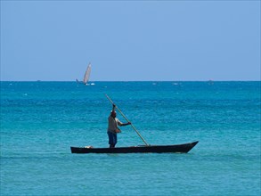 Fisherman on traditional fishing boat