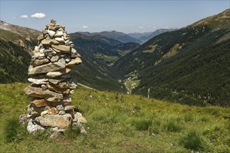 Cairns on mountain meadow