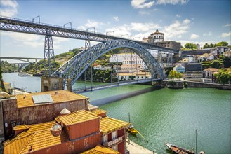 Beautiful iron Dom Luis I bridge over Douro river in Porto