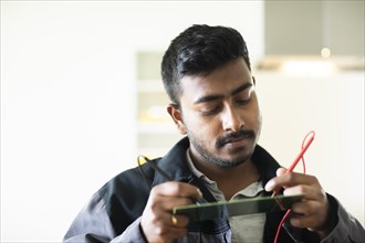 Students in an internship at the university with work equipment