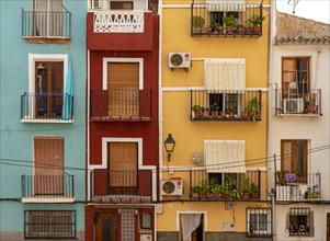 Close-up of colorful windows and balconies of fishermen's houses in Villajoyosa