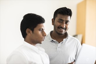 Students with laptop at the university