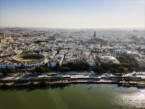 Aerial view of Seville with visible bullring and cathedral tower