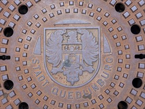 Manhole cover with city coat of arms in Quedlinburg