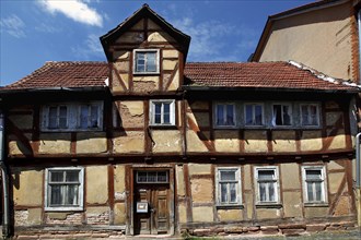 A dilapidated half-timbered house