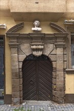 Entrance portal of a residential house at the end of the 17th century