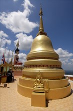 Golden Pagoda in Buddhist Temple Wat Tham Sua