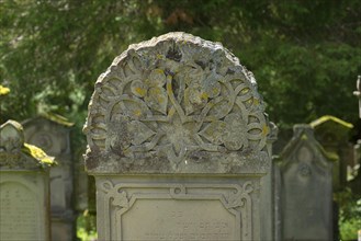 Gravestone with ornaments at the historic Jewish cemetery