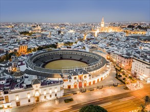 Bullring of the Real Maestranza de Caballeria surrounded by white architecture in Sevilla