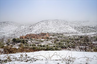 Remote Berber village after snow fall in Atlas mountains