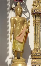 Golden Buddha with mudra sign for energy