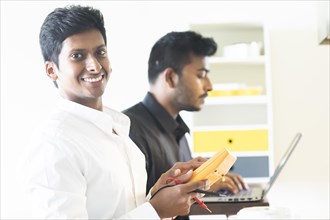 Students in an internship at the university with work equipment