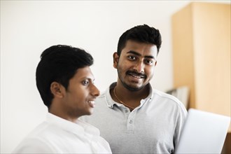 Students with laptop at the university