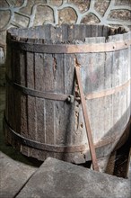 Large wooden barrel for traditional rum production