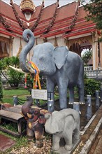Elephant statues in front of Buddhist temple Wat Chalong