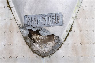 Note No step on aircraft fuselage