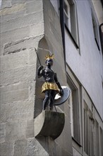 Facade figure of a half-naked black African in the old town of Constance