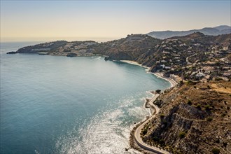 Aerial view of touristic coast in Almunecar by Mediterranean Sea
