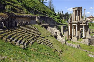 Ruin of ancient Roman theatre on steep slope