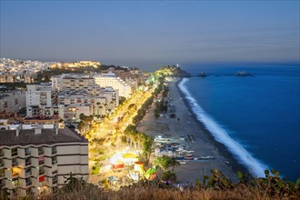 Panorama of touristic illuminated coast in Almunecar at night
