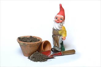 Garden gnome and garden tools