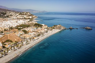 Aerial view of touristic coast in Almunecar by Mediterranean Sea