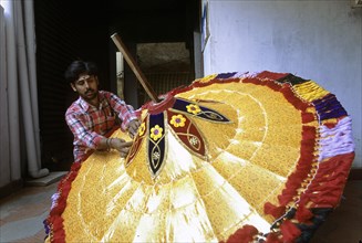 Making temple umbrellas in Chindadripet