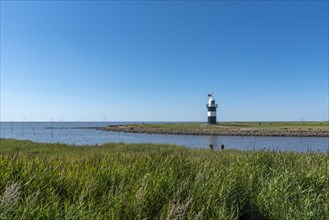 Coastal landscape with the Kleiner Preusse lighthouse in the background
