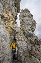 Hiker in a rock hole